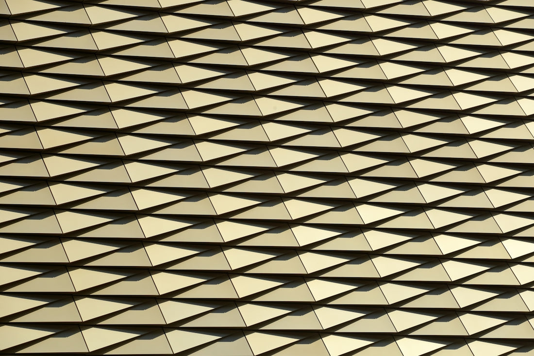 a close up of a building with many squares on it