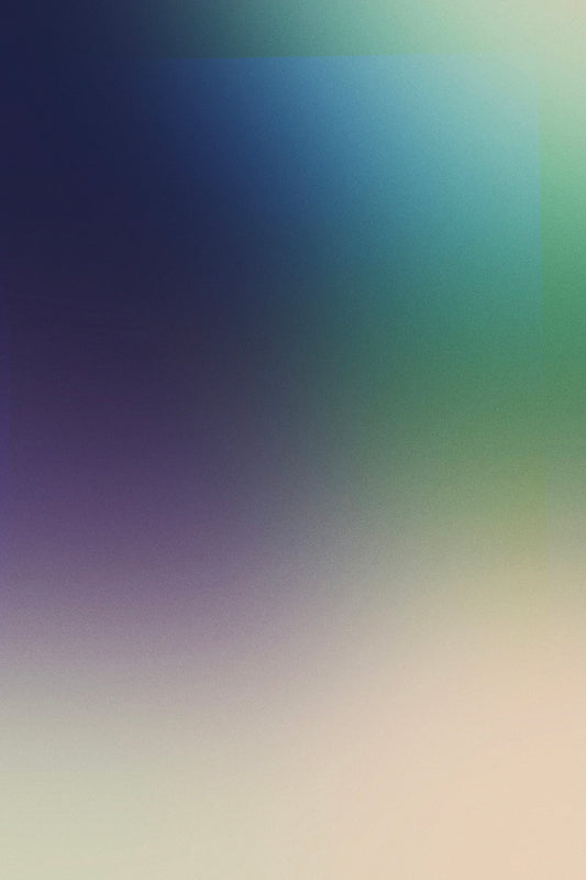 Blurred background with shades of blue, green, and pink.